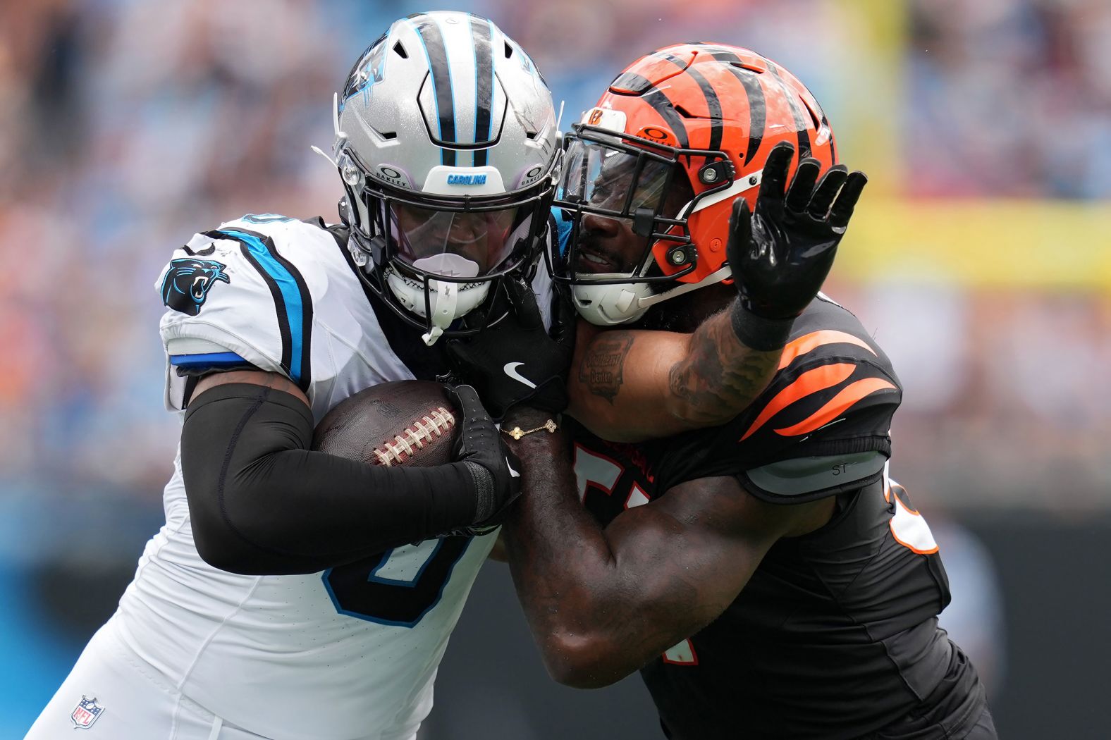 Carolina Panthers tight end Ja'Tavion Sanders fights off the tackle attempt by Cincinnati Bengals linebacker Germaine Pratt in Charlotte, North Carolina, on September 29. The Bengals beat the Panthers 34-24.