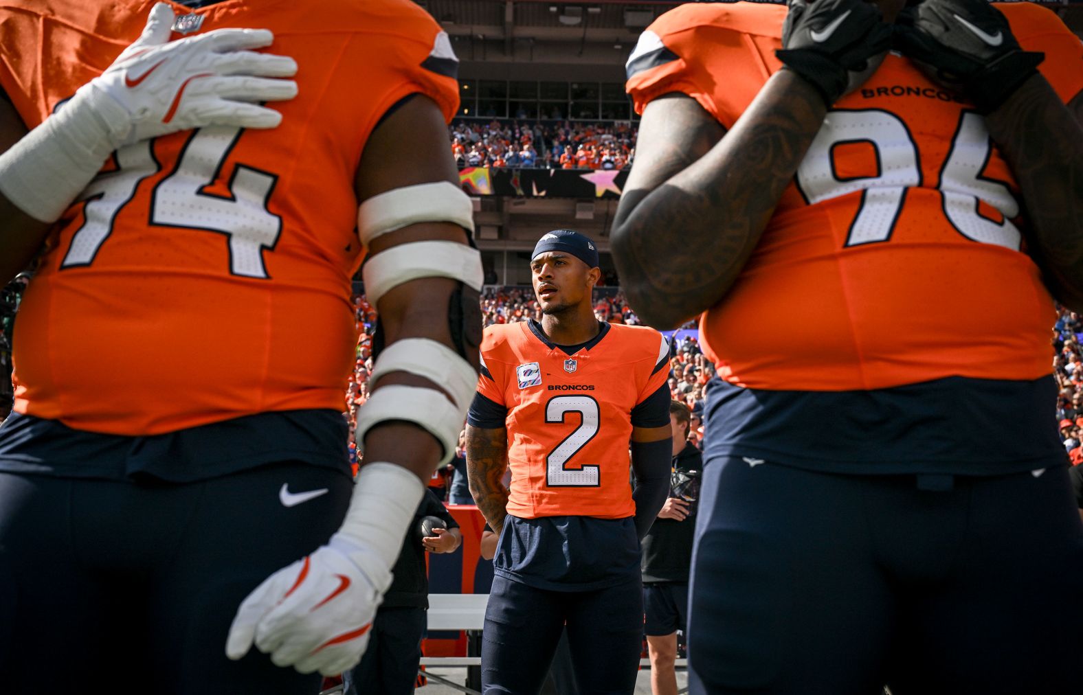 Denver Broncos cornerback Pat Surtain II stands for the national anthem on October 13.