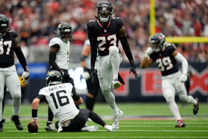 Houston Texans safety Eric Murray celebrates after sacking Jacksonville Jaguars quarterback Trevor Lawrence during the Texans' 24-20 victory in Houston on September 29.