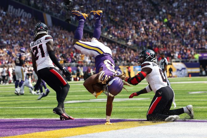 Minnesota Vikings running back Aaron Jones lands in the end zone for a touchdown in Minneapolis on September 22.