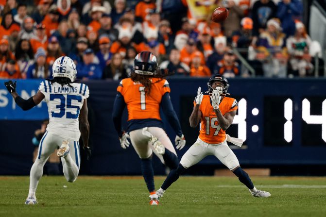 Denver Broncos wide receiver Marvin Mims Jr. catches a punt during the Broncos' 31-13 victory over the Dallas Cowboys at home in Denver on December 15.