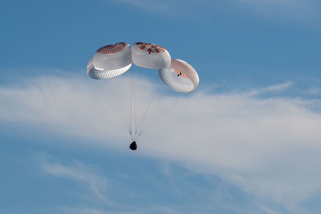 A SpaceX Dragon spacecraft, with NASA astronauts Nick Hague, Suni Williams and Butch Wilmore and Roscosmos cosmonaut Aleksandr Gorbunov aboard, is seen before splashing down in the water off the coast of Tallahassee, Florida.