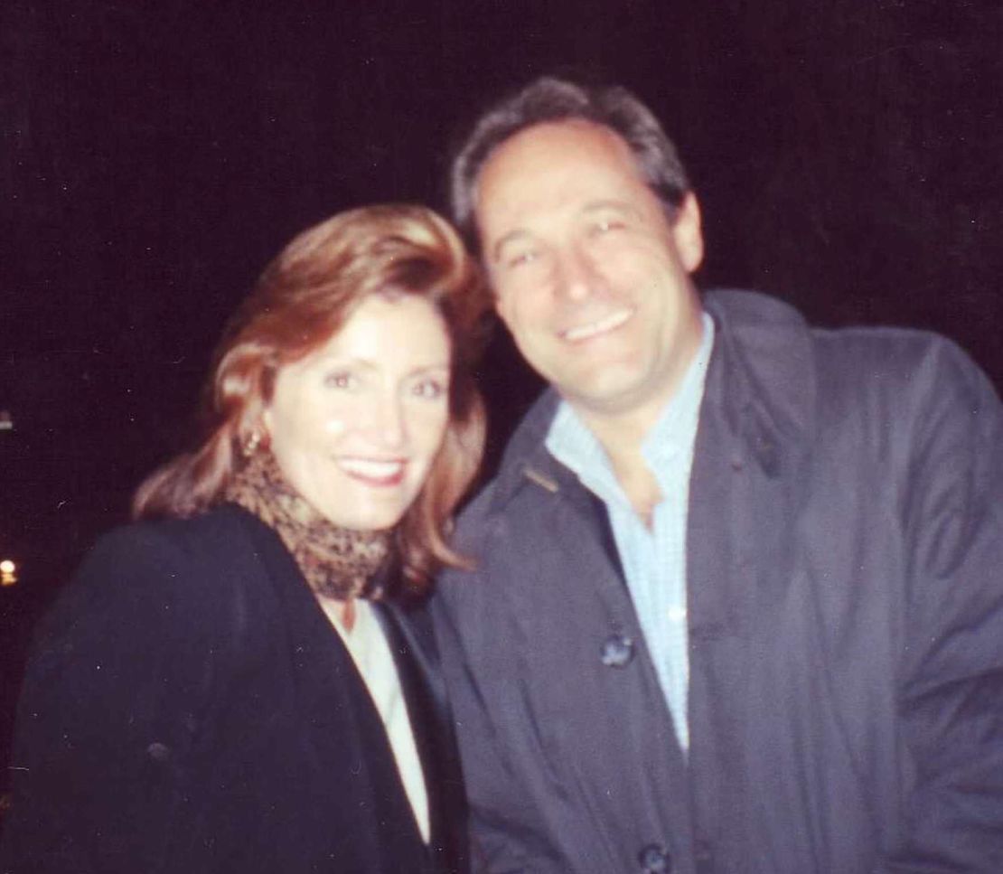 Catherine's mother took this photo of Catherine and Fausto on the night they met in 1999, in front of the Trevi Fountain in Rome.