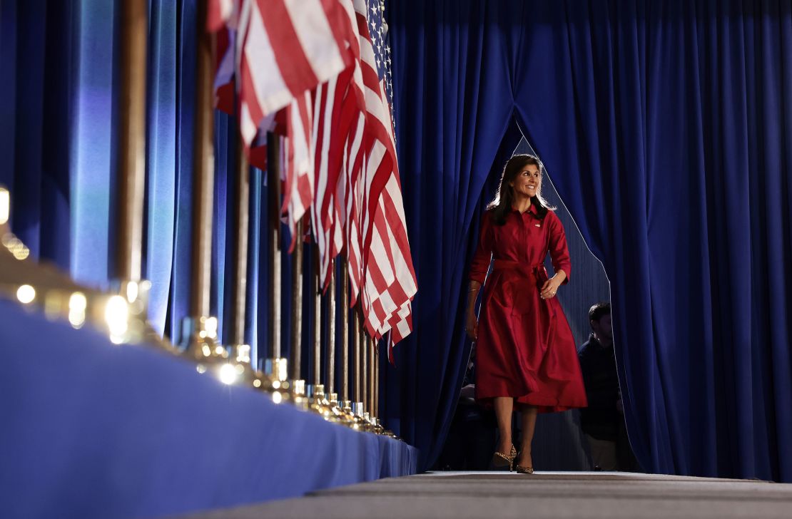 Nikki Haley walks on stage at her caucus night event on January 15, 2024 in West Des Moines, Iowa.