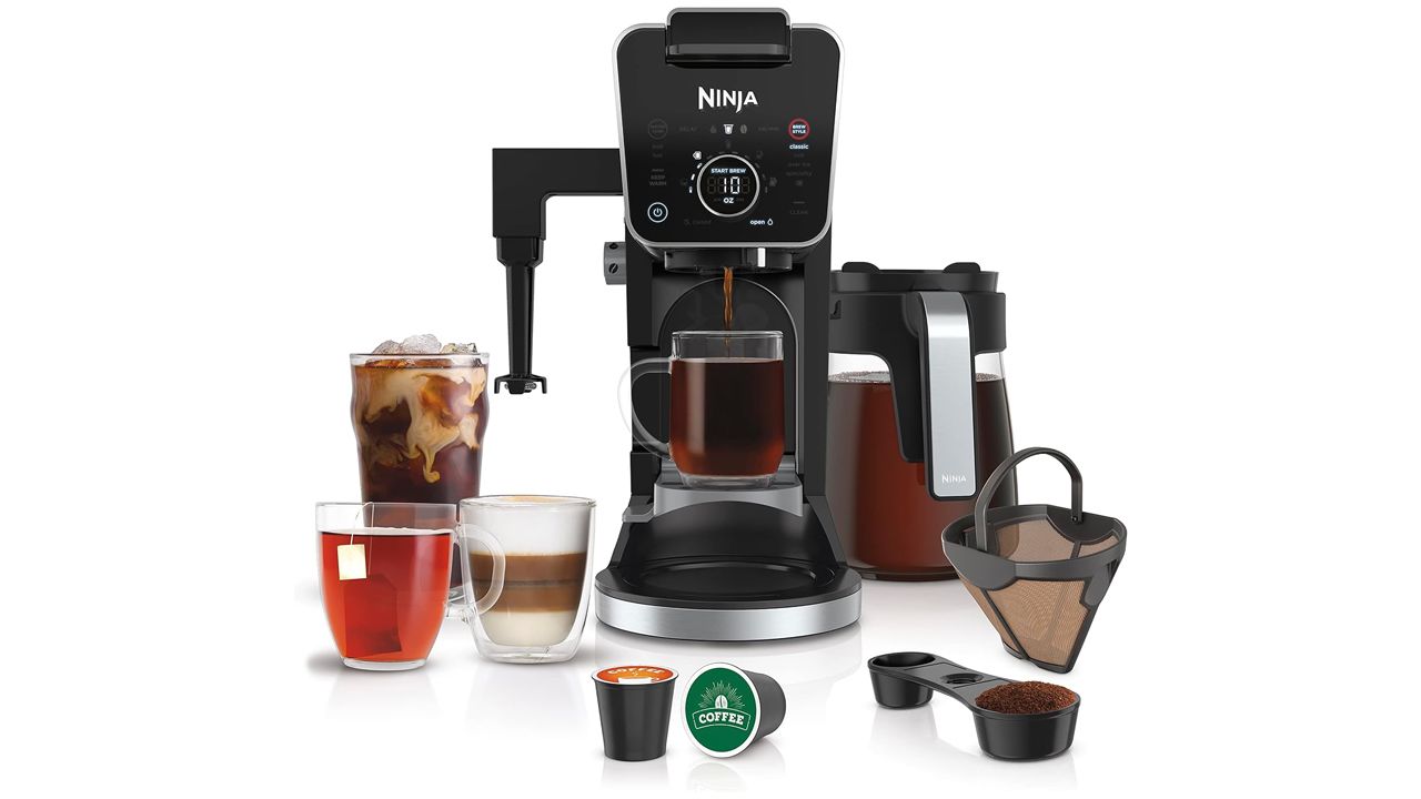 A photo of the Ninja CFP307 DualBrew Pro Specialty Coffee System and its included accessories, like a filter