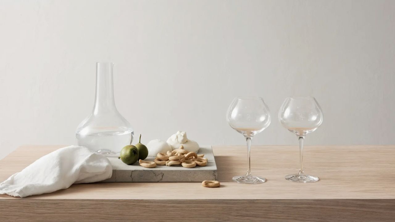 orrefors wine glasses on a table