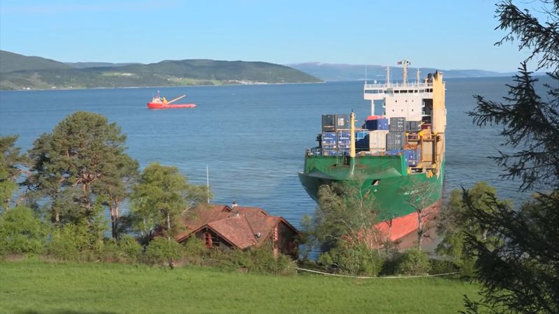 See container ship that’s run aground on man’s front lawn