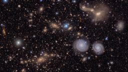 This image shows another small section of NSF-DOE Vera C. Rubin Observatory's total view of the Virgo cluster. Visible are two prominent spiral galaxies (lower right), three merging galaxies (upper right), several groups of distant galaxies, many stars in the Milky Way galaxy and more.