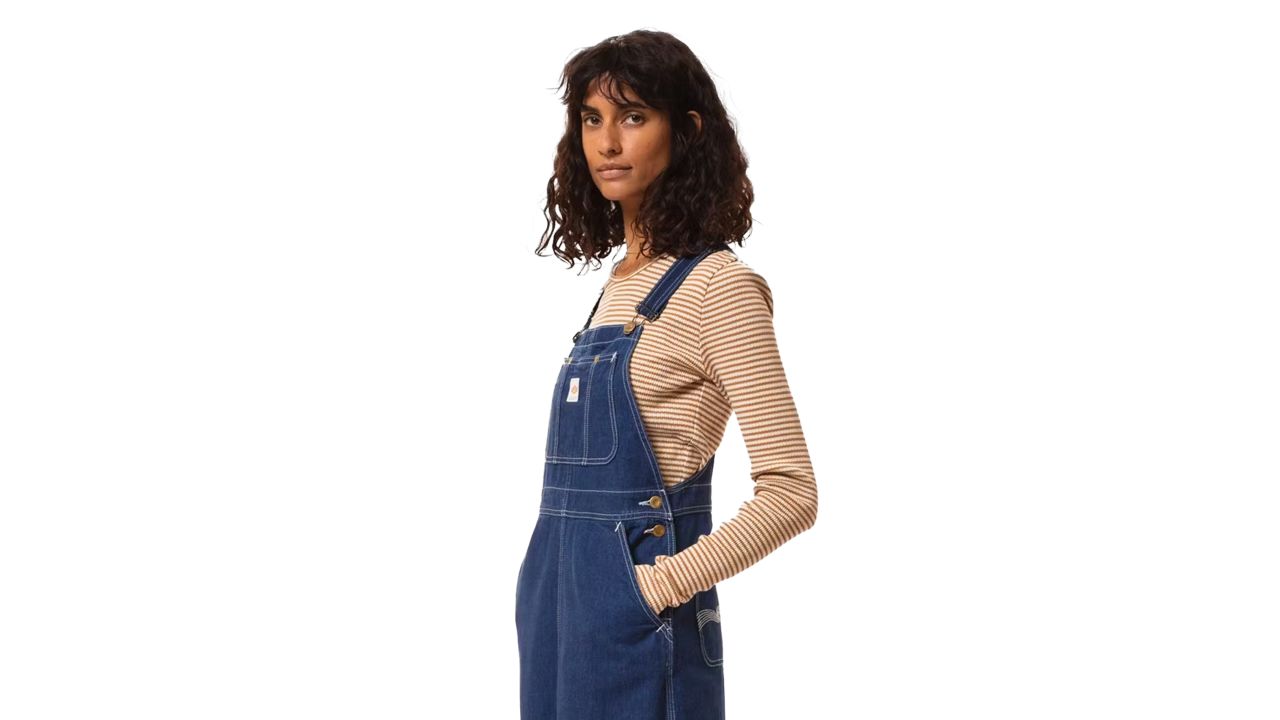 Woman wearing Nudie Jeans dungarees 