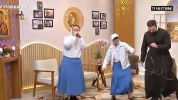 Sisters Marizele Cassiano speaks next to Sister Marsa de Paula, from the Catholic congregation ‘Copiosa Redenção’, during the program ‘Familia de Amor’ (Family of Love) on the Catholic TV network “Eternal Father”