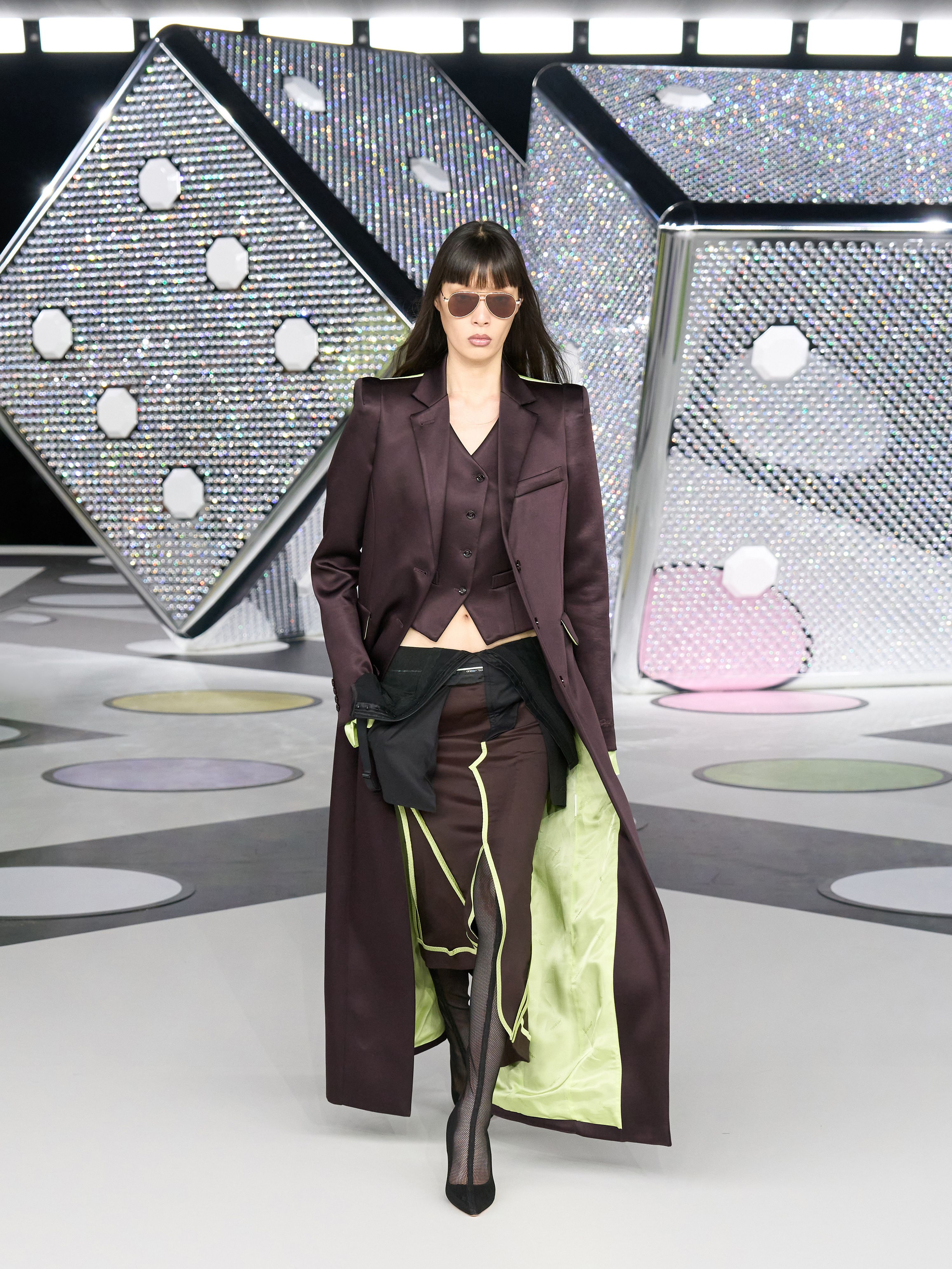 His working woman, global and ageless, came with faux fur, maximalism, in playful, hybrid cuts.