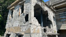 After the Battle of Okinawa in 1945, the only structure left standing on the offshore island of Ie Shima was its pawnshop. It still shows the scars of war today.