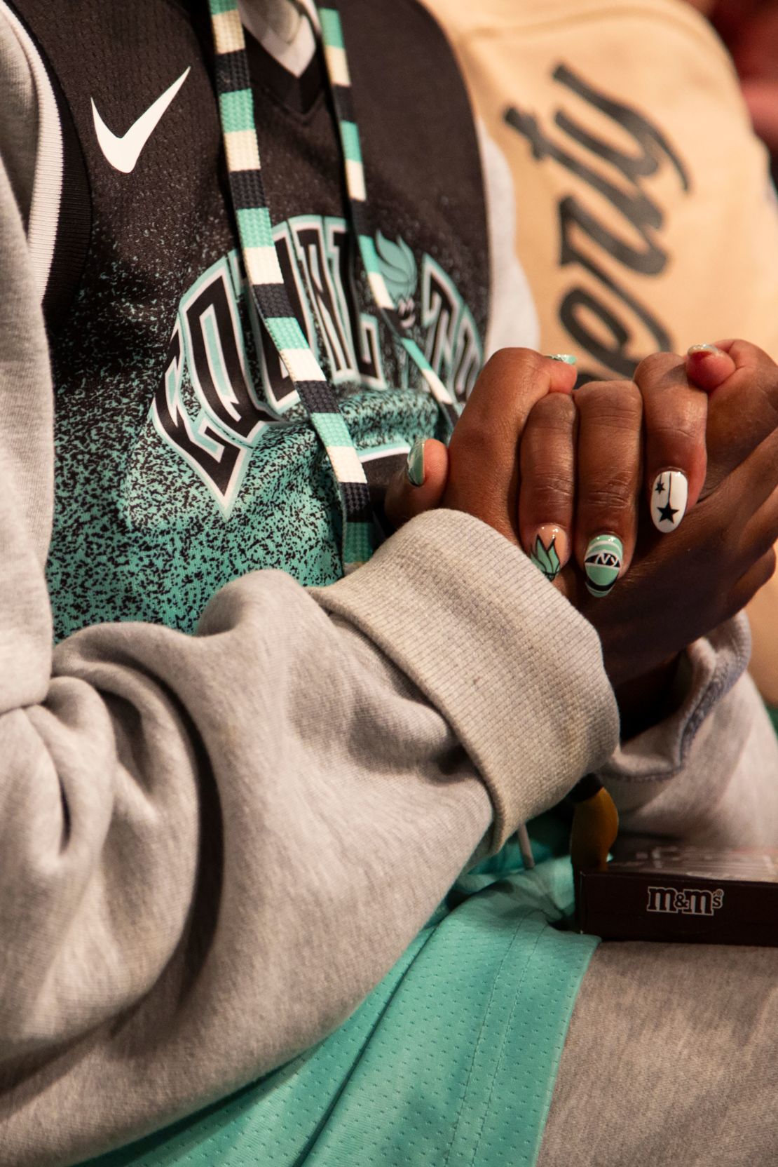 Season ticket holder Arvetta Drumgold had her nails done to match the Liberty's colors.