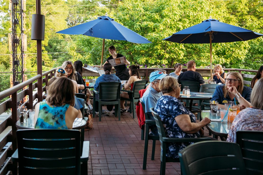 Northampton Brewery boasts a pleasant back deck under a canopy of trees where customers can enjoy the craft brewpub's IPAs and stouts.