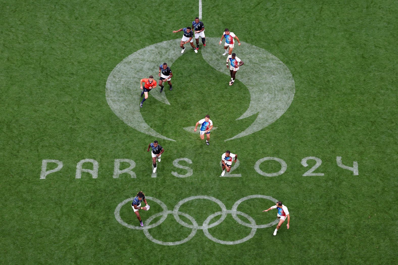 Fiji's Selestino Ravutaumada carries the ball during the rugby sevens final against France on July 27. France won the match for <a href="https://www.cnn.com/sport/live-news/paris-olympics-news-2024-07-27#h_d459e9fe5b9949f1ac2cee5f45330804">its first gold medal of these Games</a>.