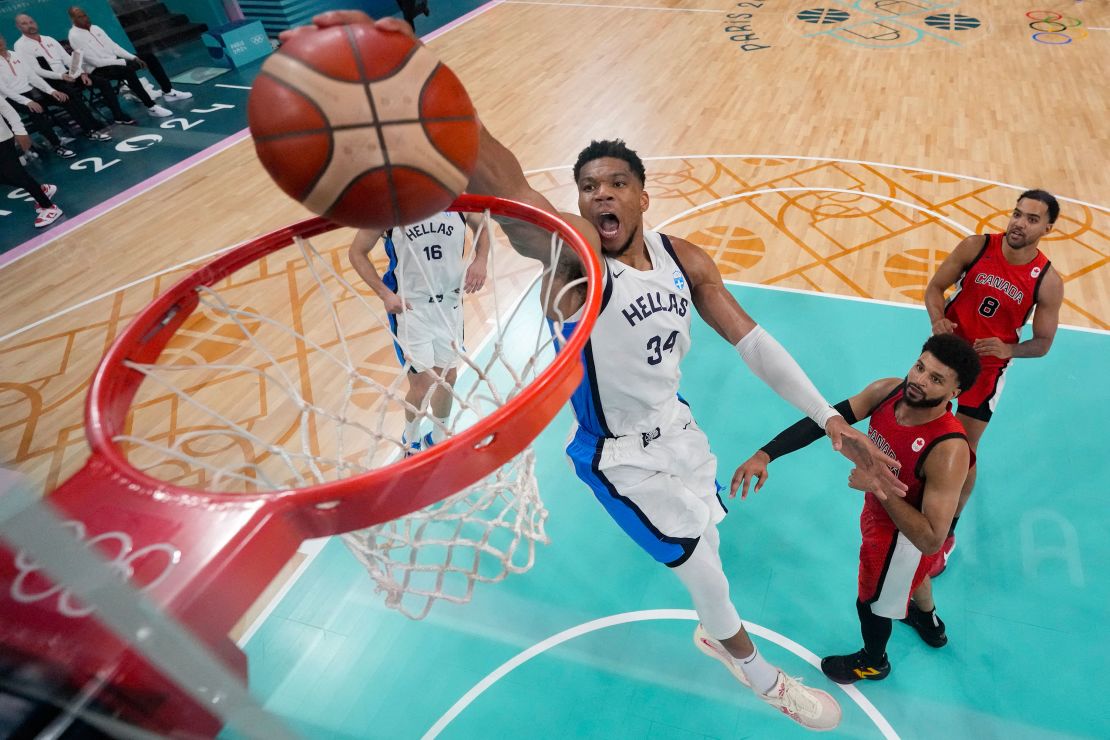 Greece's Giannis Antetokounmpo dunks the ball in the men's preliminary round during the Paris 2024 Olympic Games.