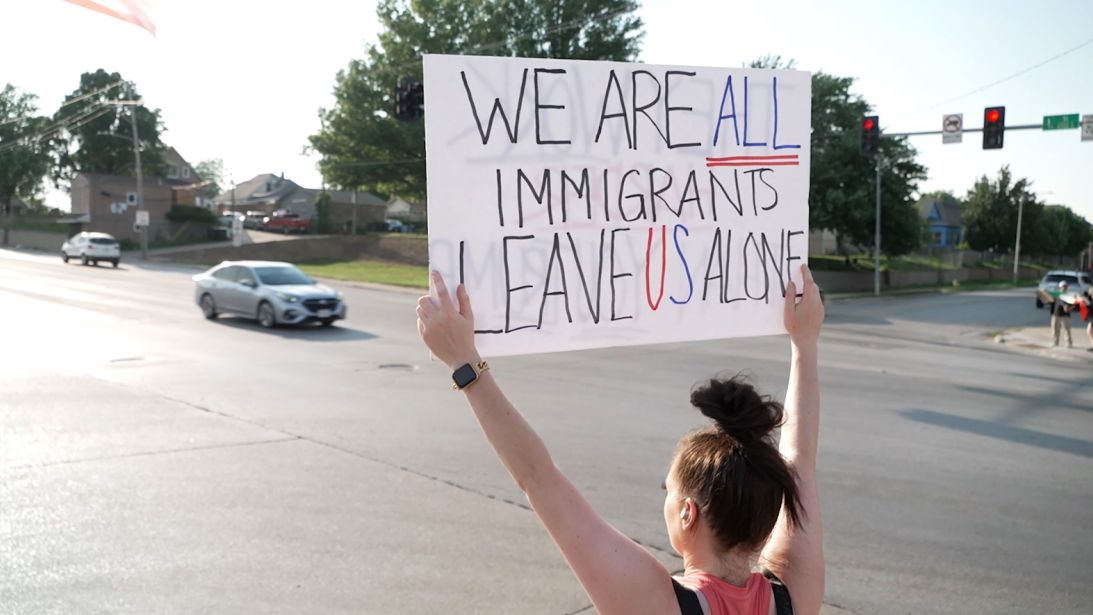 Protesters gathered in Omaha after federal agents detained dozens of workers at a meatpacking plant in June.