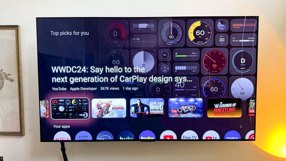 A TV plugged into the Onn 4K Pro shows "Top picks for you" with "WWDC24: Say hello to th? next generation of CarPlay design"