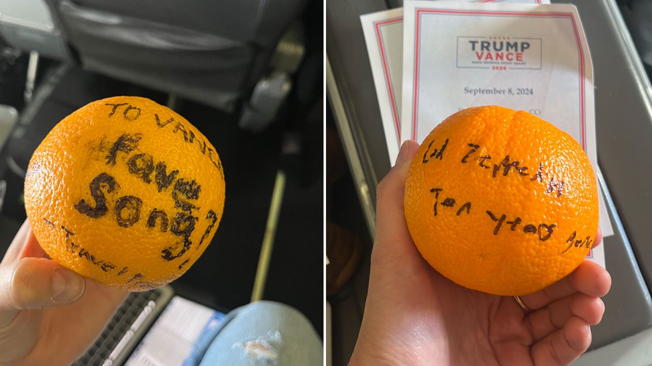 A question written on an orange was rolled to Sen. JD Vance on his campaign plane on Tuesday, Octoaber 8.