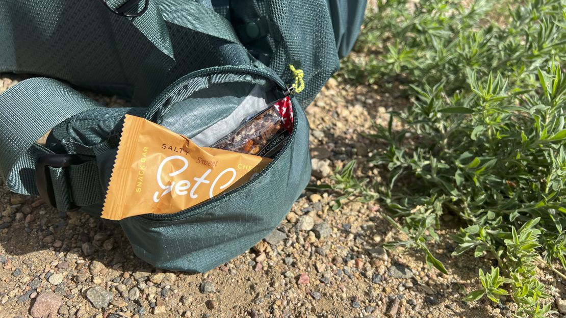 REI Co-Op Flash hipbelt pockets with snacks poking out