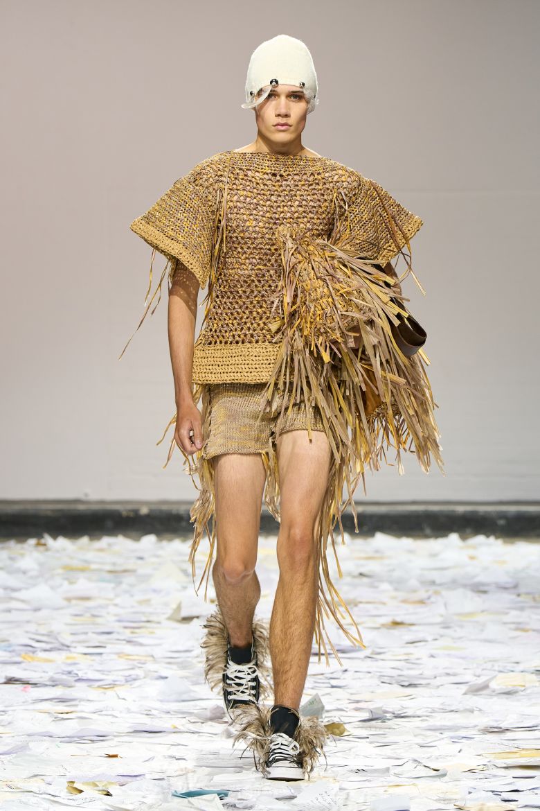 Braided tunics and bags seemed to be made from straw.