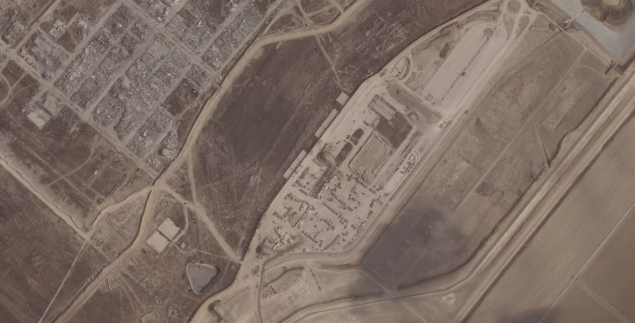 Satellite imagery shows a buildup of Israeli military vehicles near the Nahal Oz crossing into Gaza on Friday.