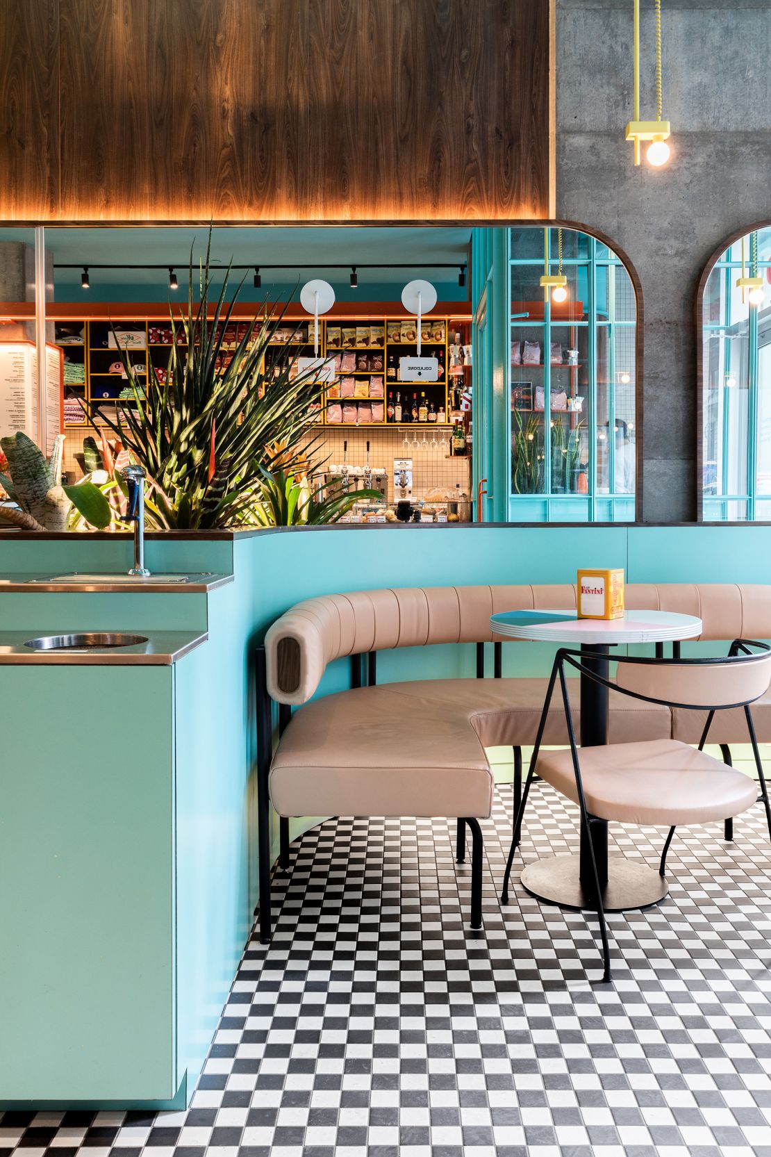 In an increasingly competitive coffee industry, coffee shop owners are putting thoughts into how their spaces are designed. For some that means quirky, bold designs — like Caffettiera in Montreal, Canada, pictured above, a bright space with blue and green hues and faux wooden panels. ‘90s-era books, stickers, toys and photos can be found throughout.