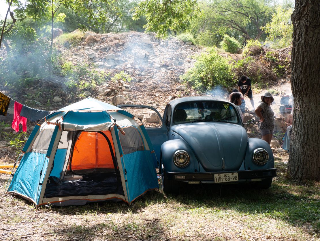 A sky blue "Vocho" is part of the family during a weekend camping trip in central Mexico