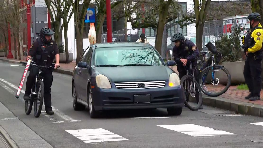 Portland police Officers David Baer and Donny Mathew stop a vehicle without license plates near a street corner known to be frequented by fentanyl dealers.
