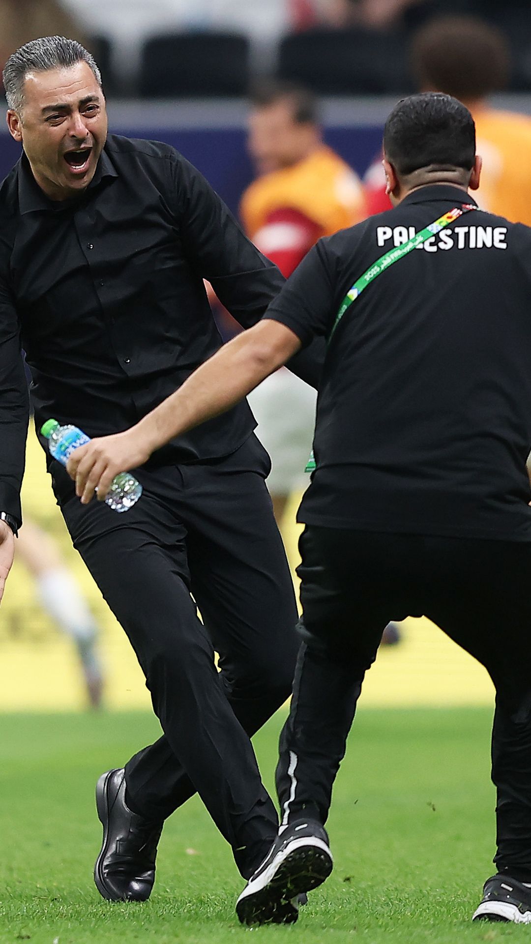 palestine coach celebration.jpg