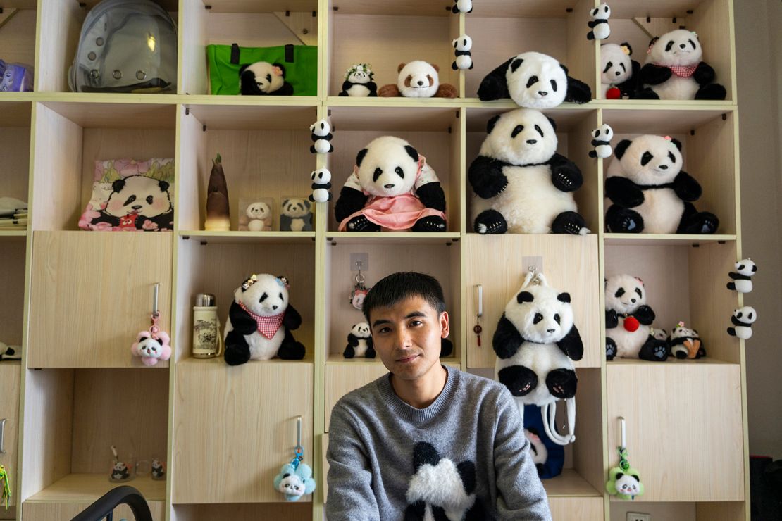 Panda influencer A'Qiu shares his bedroom with dozens of Hua Hua stuffed toys.