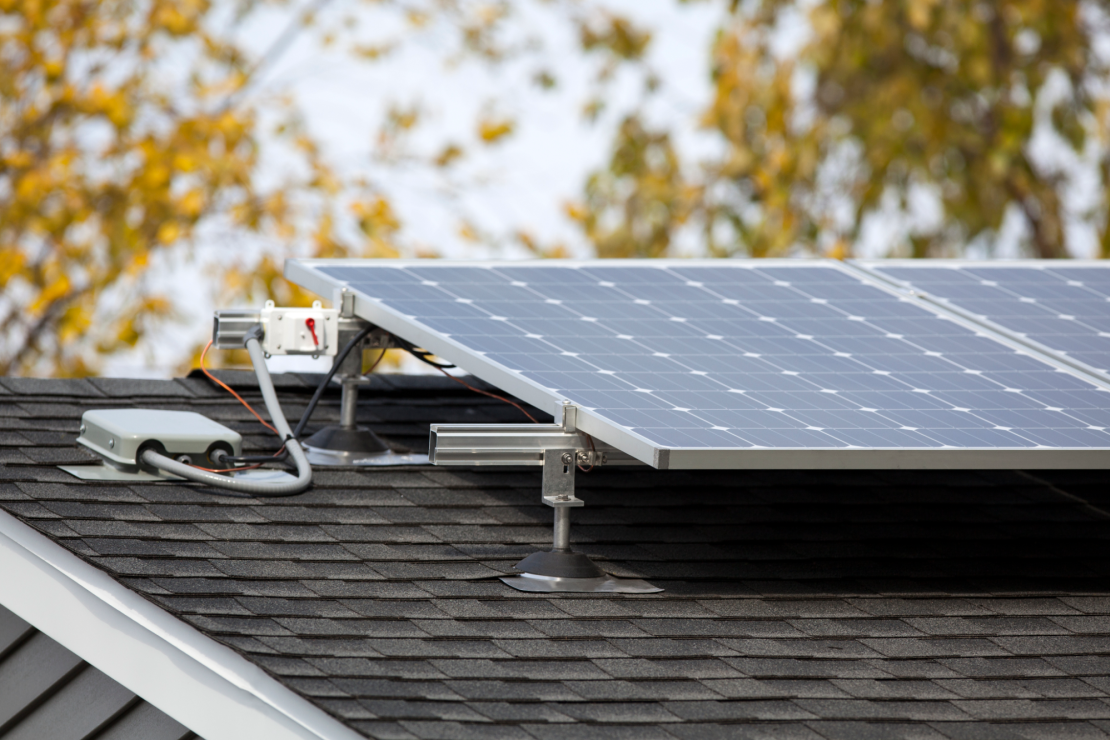 Close-up of traditional solar panels on a residential roof