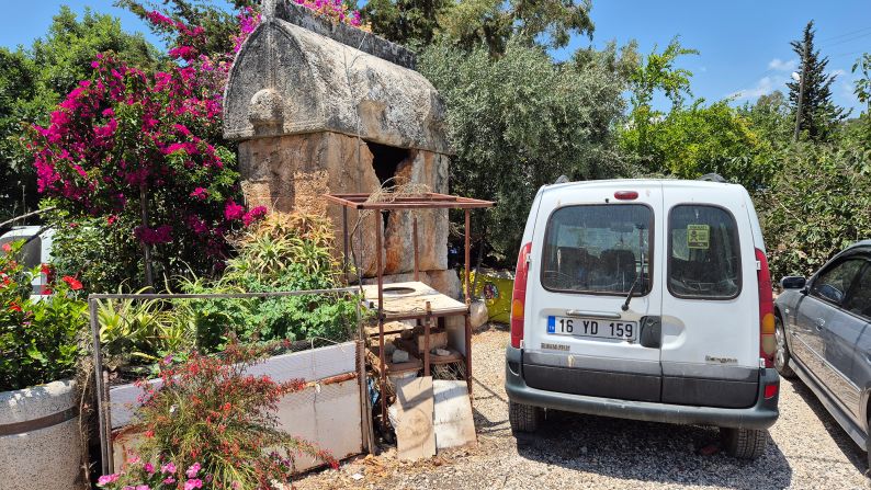 <strong>Sarcophagus with parking: </strong>Kaleüçağız has so many ancient treasures that some have become part of the wallpaper, like this ancient sarcophagus in a parking spot.