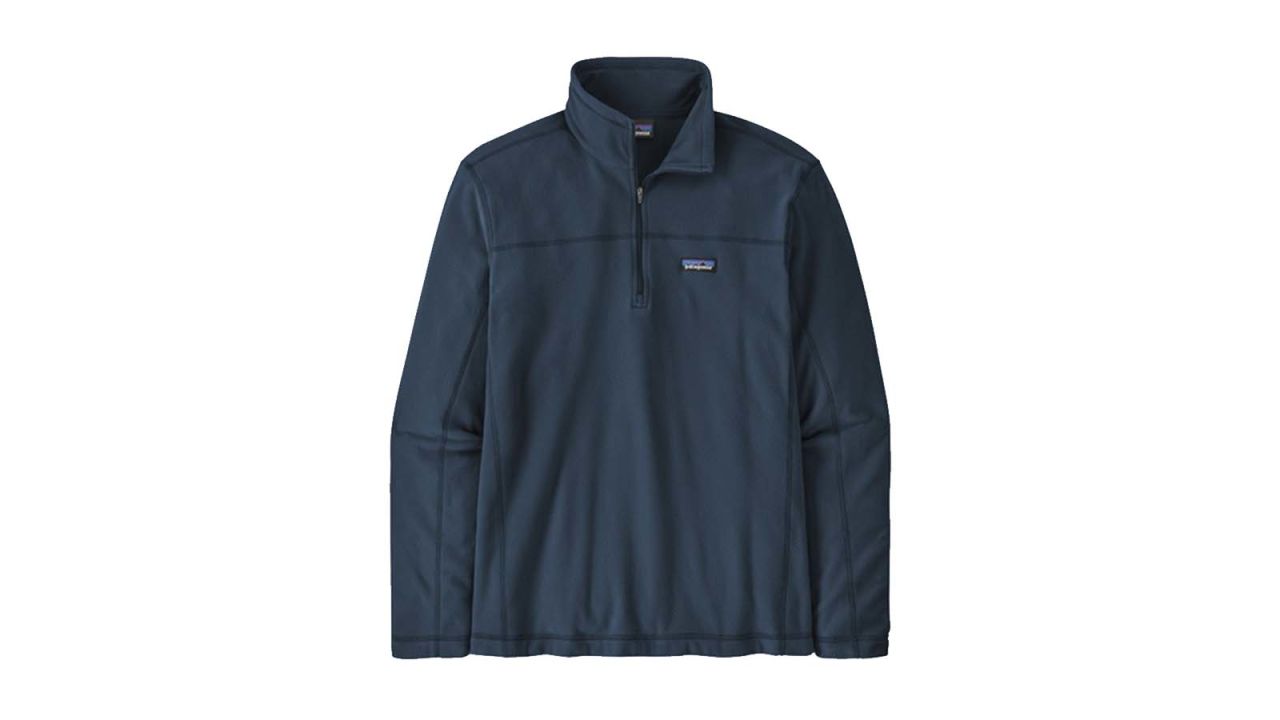 A blue quarter-zip sweatshirt against a white background.