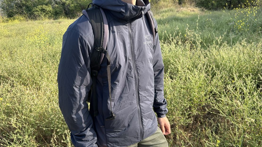 Man wearing Arc'teryx Atom Hoodie in Black Saphire