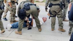 Paul Ivery is arrested outside the Broadview, Illiniois ICE facility on September 26.