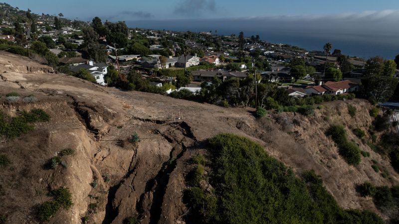 ‘Hell no, we’re not leaving’: A California community defies evacuation warning as ancient landslide rips their homes apart