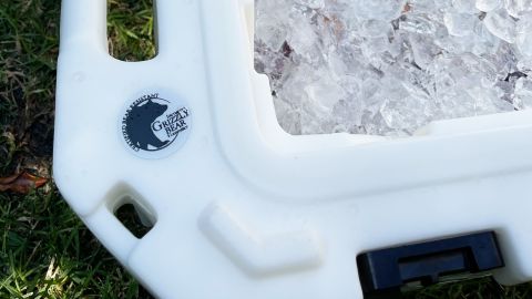Bearproof sticker on the lip of the Pelican Elite 45 cooler