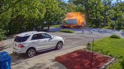 A home security camera caught the moment when a box truck driving through a residential neighborhood exploded in Addison, Illinois. The driver walked away with only minor injuries, CNN affiliate WLS reports.