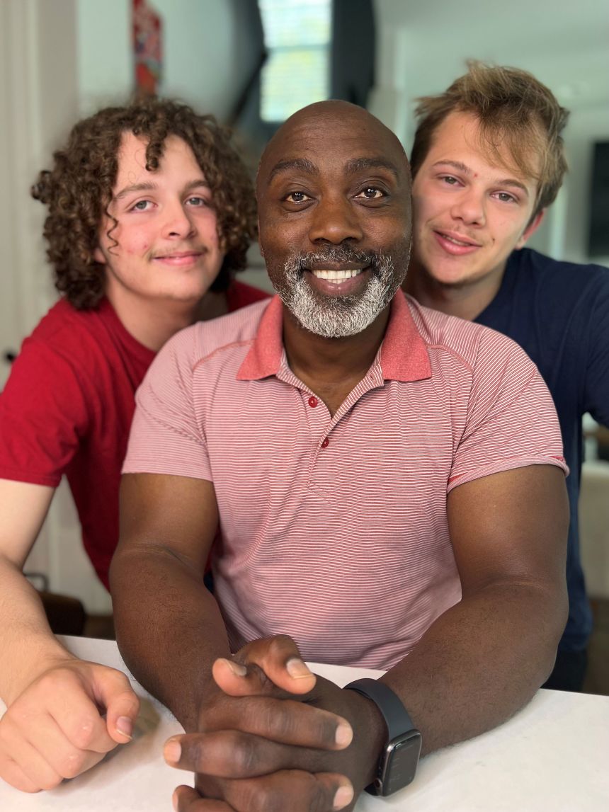Peter Mutabazi at home with his sons Anthony, left, and Zay. “Dreaming wasn’t part of my ecosystem (as a child),” he says.