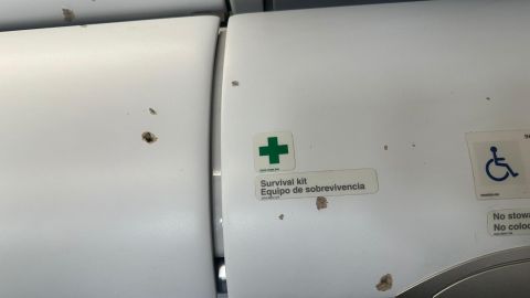 An image taken from social media shows damage to the interior of the plane
