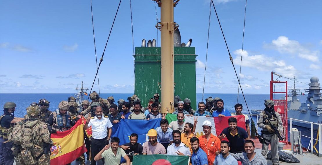 After their release, crew members of MV Abdullah pose for a picture with the Operation Atalanta marines in April 2024.