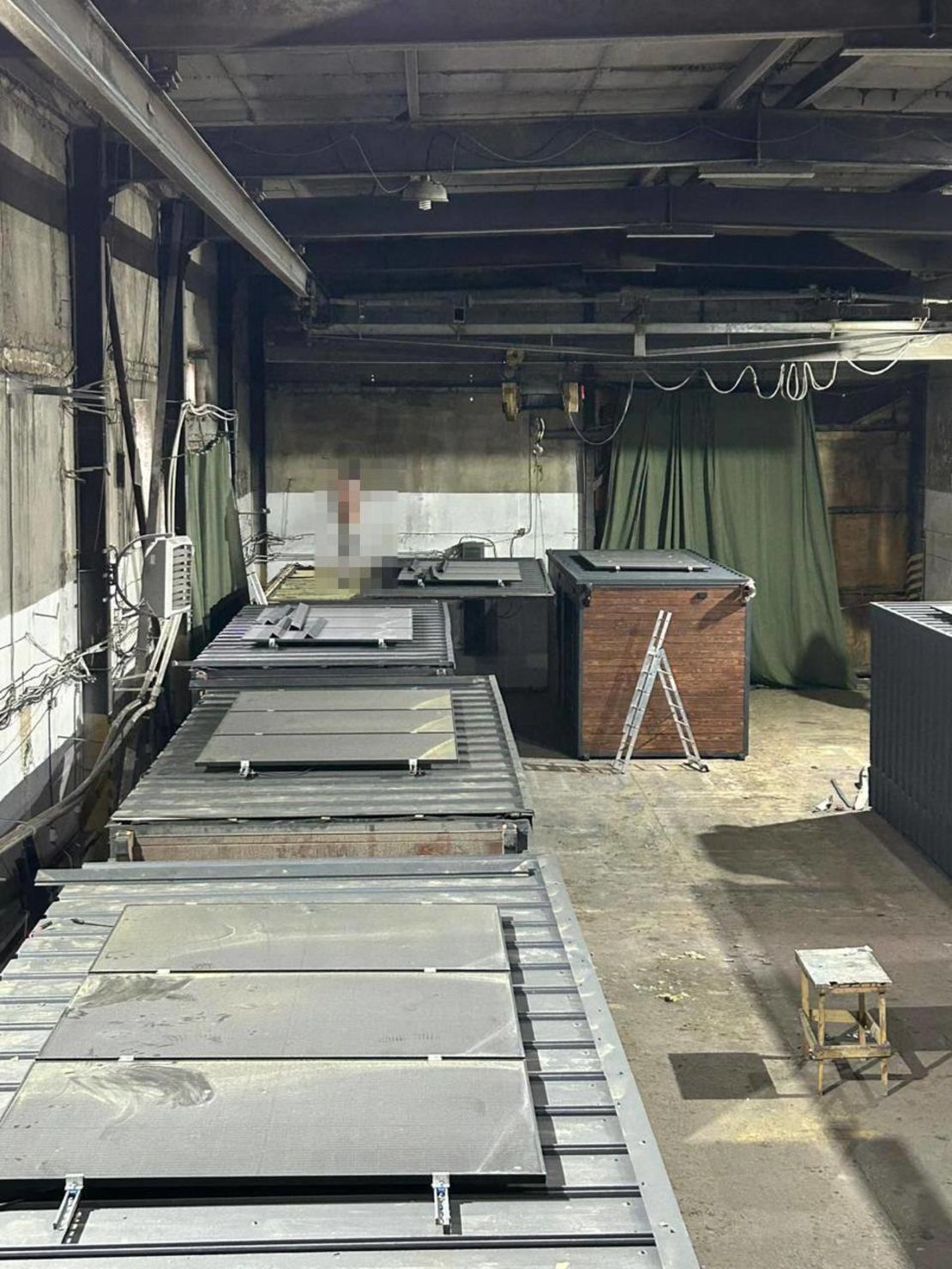 This handout photo from the Ukrainian Security Service shows wooden sheds in an industrial facility. (Note: The location and date of this image has not been independently verified and a portion of this image was blurred by the source.)