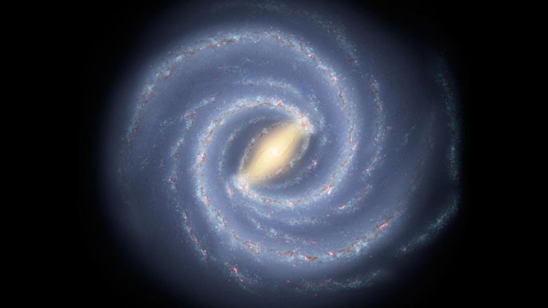 Una concepción artística representa la Vía Láctea y su forma espiral. Nuestro sistema solar se encuentra en uno de los brazos espirales.