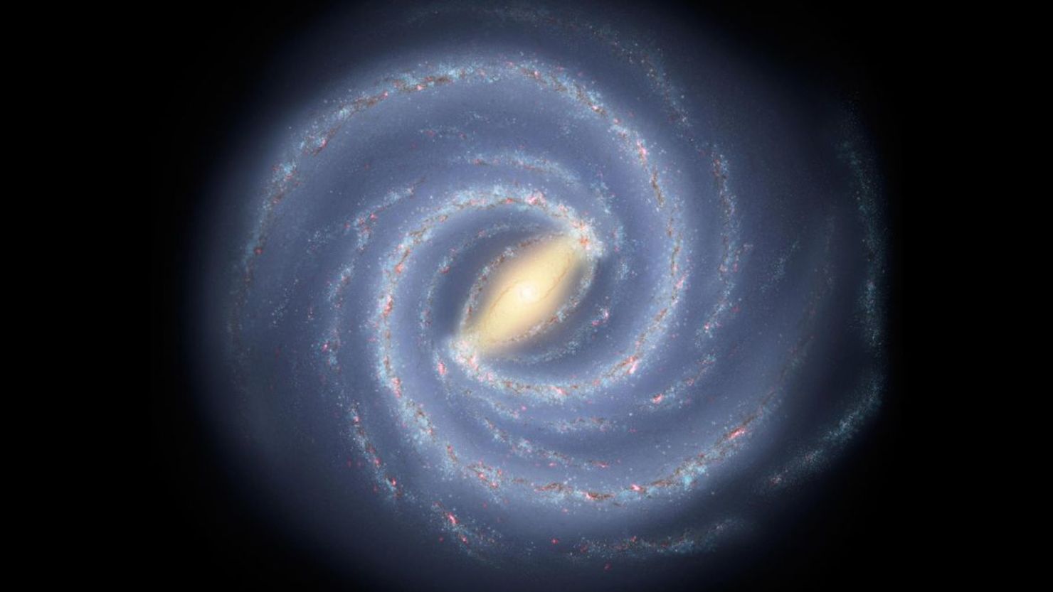 Una concepción artística representa la Vía Láctea y su forma espiral. Nuestro sistema solar se encuentra en uno de los brazos espirales.