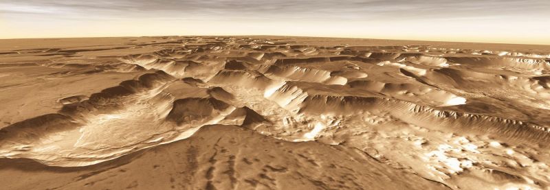 West of Valles Marineris lies a checkerboard named Noctis Labyrinthus, which formed when the Martian crust stretched and fractured. This image is from NASA Mars Odyssey, one of an All Star set.