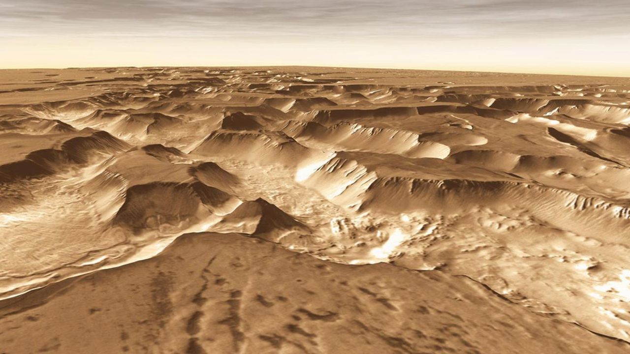 West of Valles Marineris lies a checkerboard named Noctis Labyrinthus, which formed when the Martian crust stretched and fractured. This image is from NASA Mars Odyssey, one of an All Star set. 