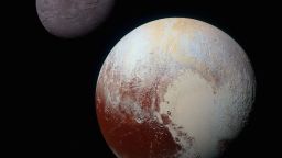 Charon and Pluto: Strikingly Different Worlds<br />NASA ID: PIA19966<br />A composite of enhanced color images of Pluto (lower right) and Charon (upper left), taken by NASA's New Horizons spacecraft as it passed through the Pluto system on July 14, 2015. This image highlights the striking differences between Pluto and Charon. The color and brightness of both Pluto and Charon have been processed identically to allow direct comparison of their surface properties, and to highlight the similarity between Charon's polar red terrain and Pluto's equatorial red terrain. Pluto and Charon are shown with approximately correct relative sizes, but their true separation is not to scale. The image combines blue, red and infrared images taken by the spacecraft's Ralph/Multispectral Visual Imaging Camera (MVIC).