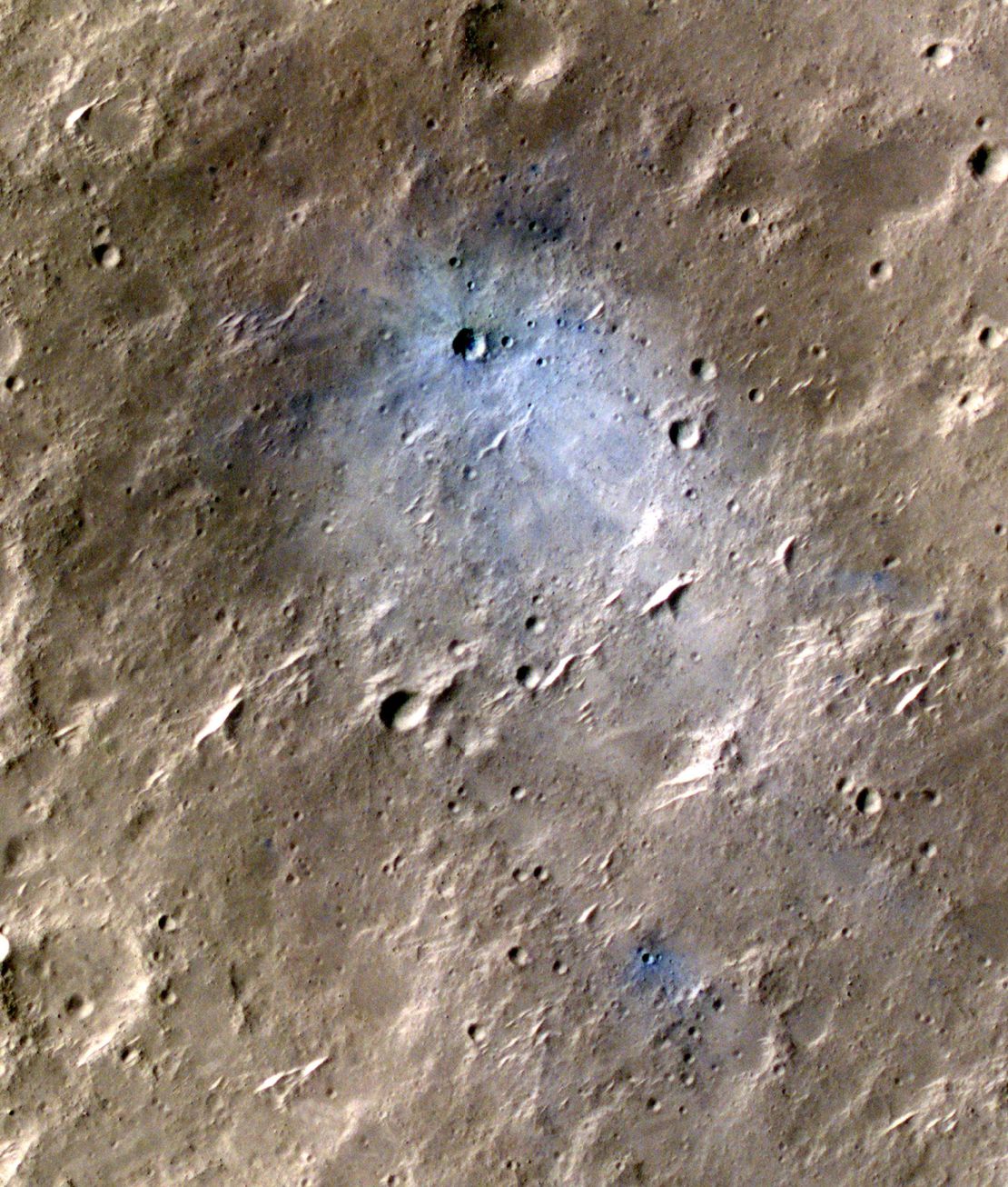 NASA's Mars Reconnaissance Orbiter captured an image of a meteoroid impact that was later associated with a seismic event detected by the agency's InSight lander. This crater was formed on May 27, 2020.
