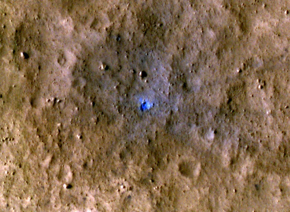 InSight data was matched with photos from orbiters, such as this one of an impact crater created on August 30, 2021, to pin down when and where meteoroid strikes happen on the red planet.